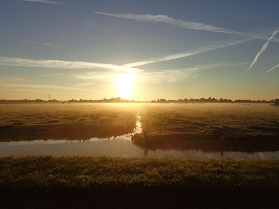 Free Image of Sunrise in the Netherlands over fields 