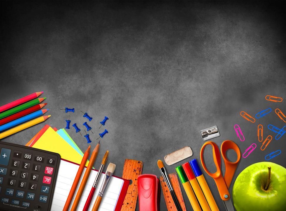Download Free Stock Photo of Illustration of school supplies and material on blackboard backg 