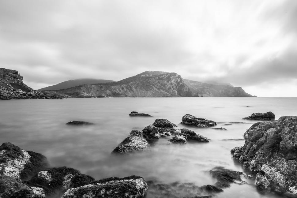 Free Image of Rocky Beach Landscape in Black and White 