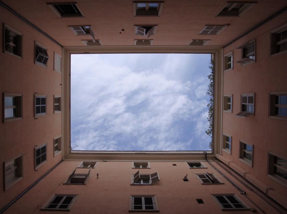 Free Image of View of the Sky Through a Window in a Building 