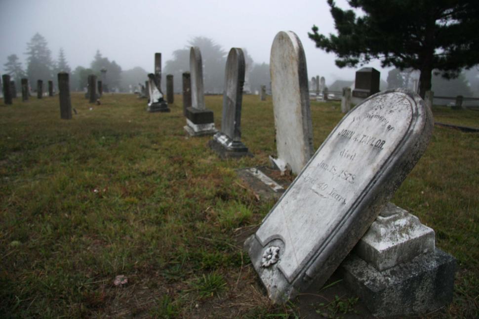 Free Image of Toppled headstone 