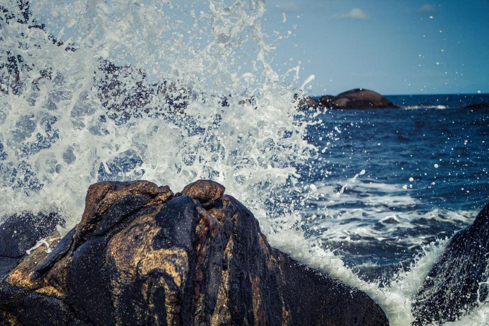 Free Image of Wave Crashes on Rock in Ocean 