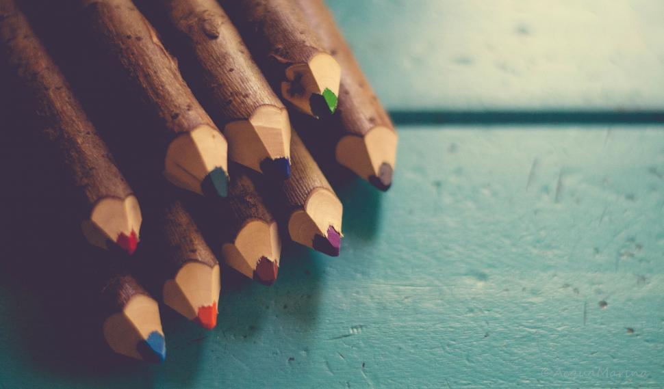 Free Image of Group of Pencils on Blue Table 