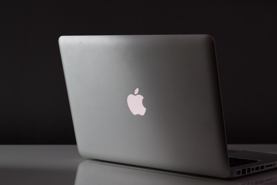 Free Image of Apple Laptop Computer on Table 