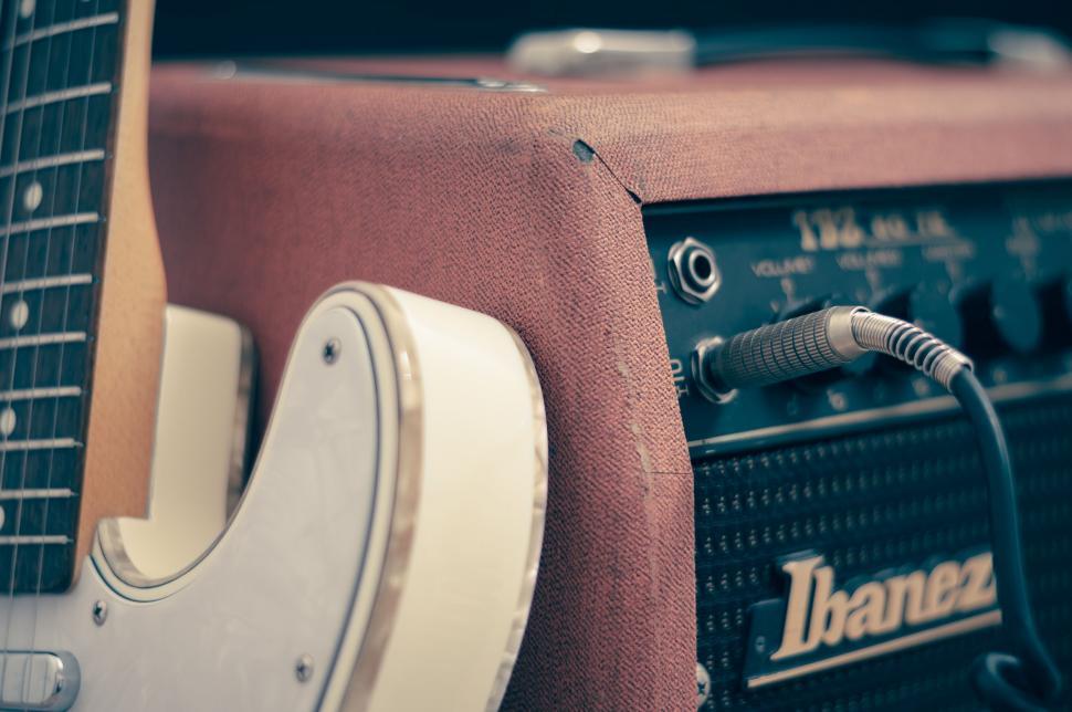 Free Image of Close Up of Guitar and Amp 