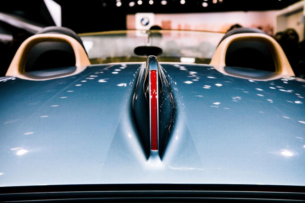 Free Image of Close Up of the Front of a Blue Sports Car 