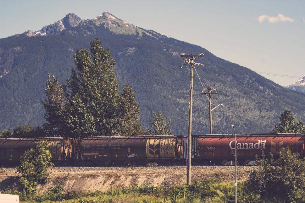 Free Image of Train Traveling Through Rural Countryside 
