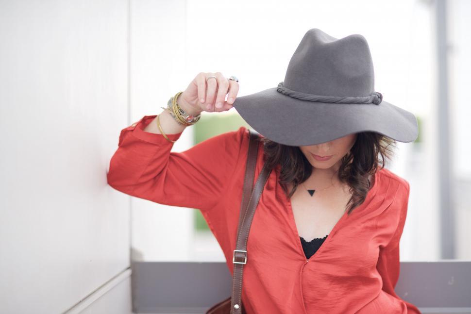Free Image of Woman in Red Shirt and Gray Hat 