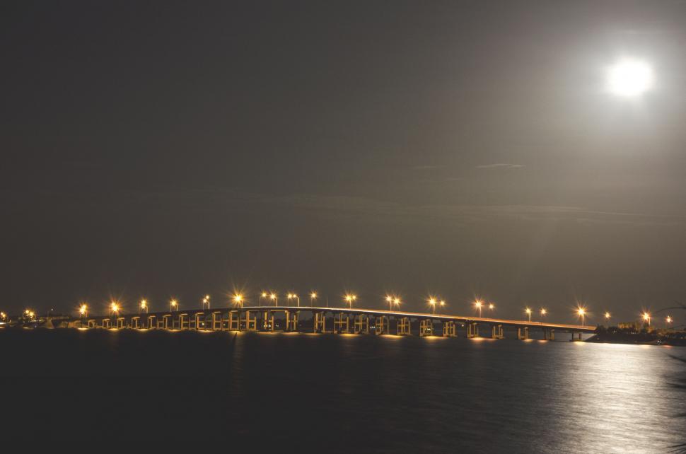 Free Image of Long Bridge Spanning Large Body of Water 