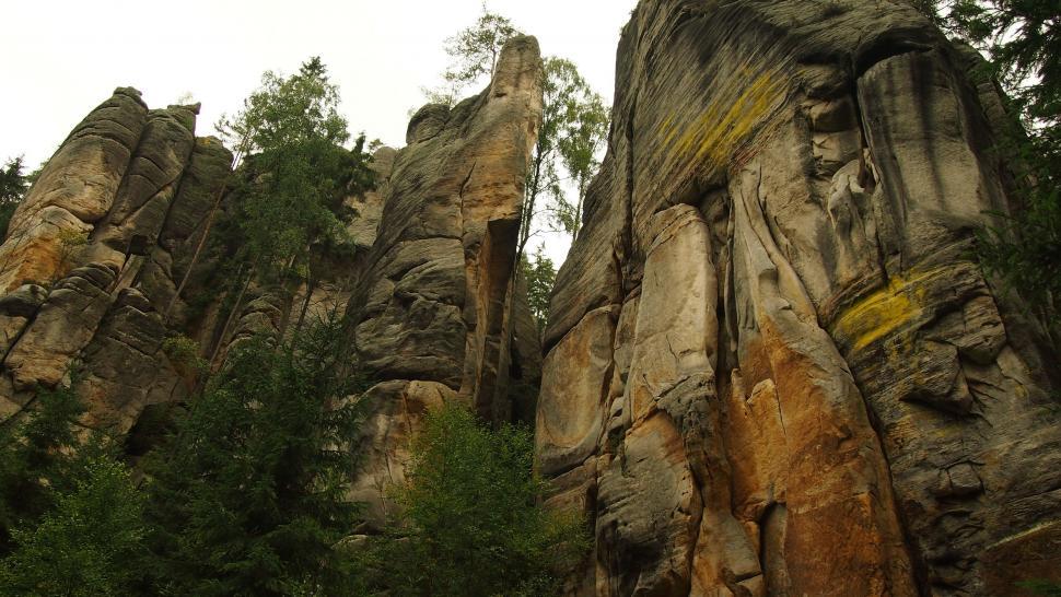 Free Image of Majestic Rock Formation With Trees 