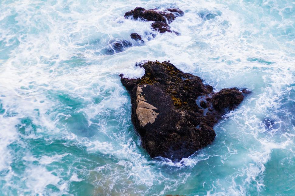 Free Image of A Rock in the Middle of the Ocean 