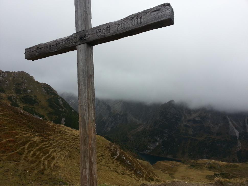 Free Image of Wooden Sign on Pole on Mountain 