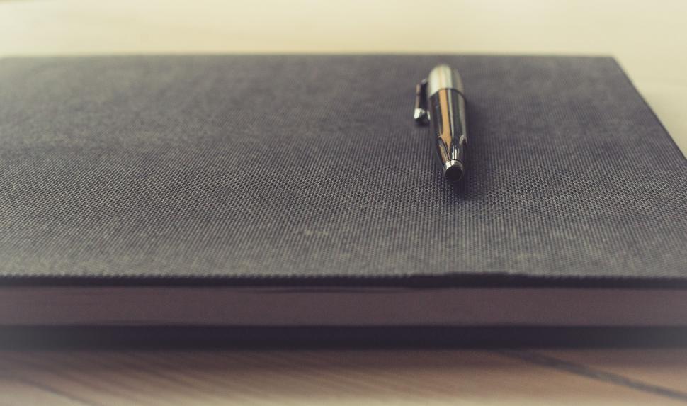 Free Image of Black Notebook With Pen 