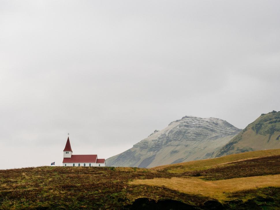 Free Image of Church on Hill Overlooking Mountain 