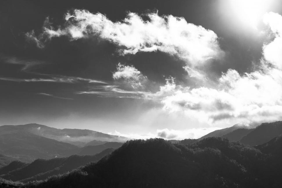 Free Image of Clouds and Mountains in Black and White 