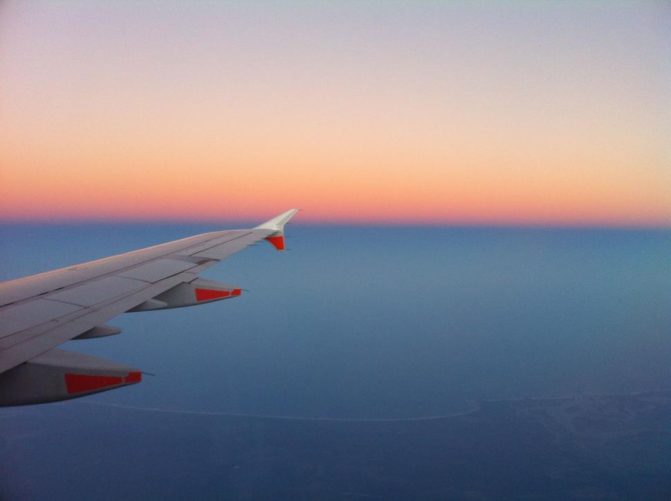 Free Image of Wing of Airplane at Sunset 