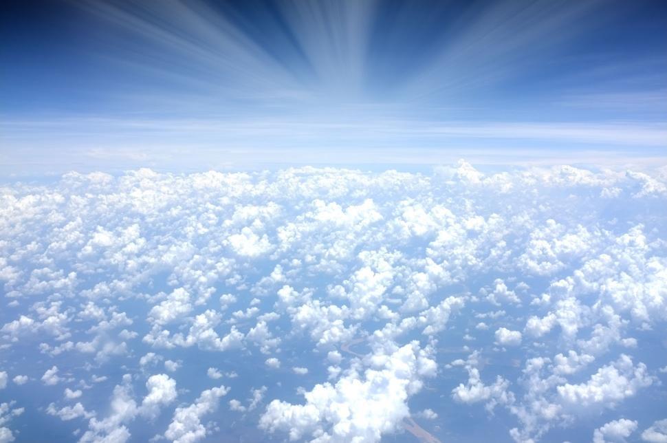 Free Image of A Glimpse of the Sky and Clouds From an Airplane 