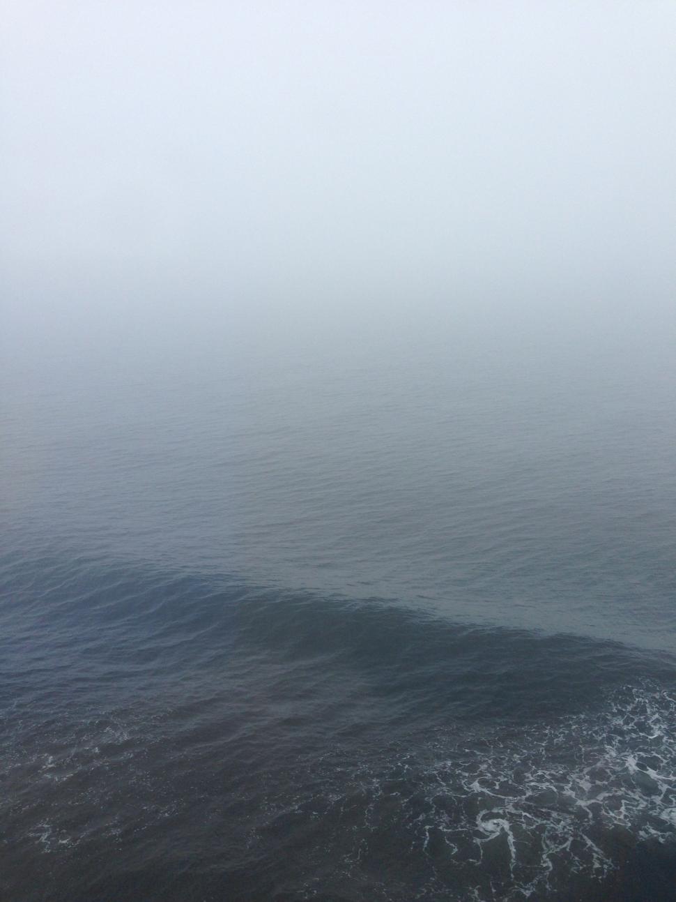 Free Image of Misty Lake Surrounded by Fog 