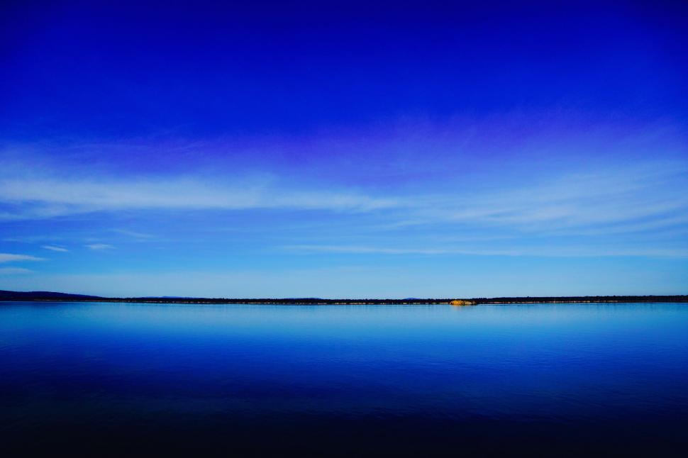 Free Image of Vast Water Body Beneath Blue Sky 