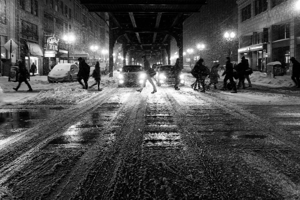 Free Image of People Walking in the Snow 