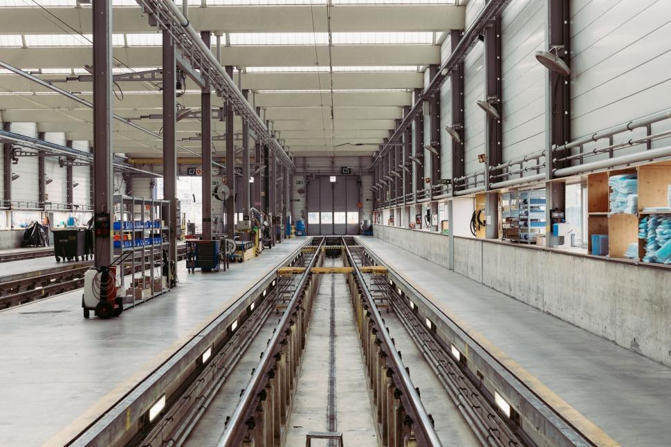 Free Image of Massive Industrial Building With Steel Beams 