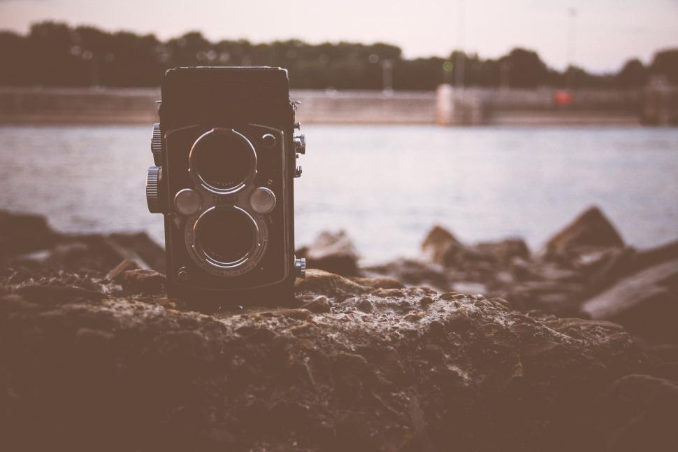 Free Image of Camera on Rock by Water 