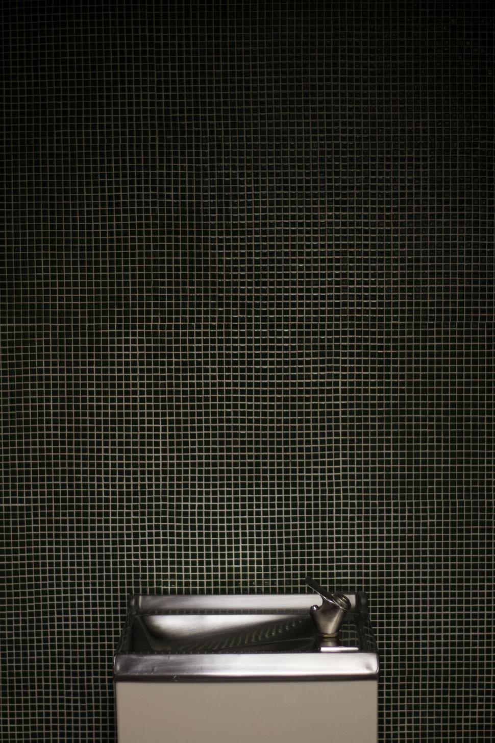 Free Image of Metal Urinal on Tiled Floor 
