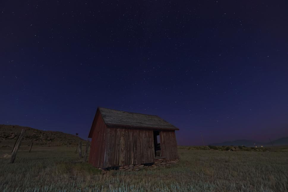 Free Image of Barn Standing in Field at Night 
