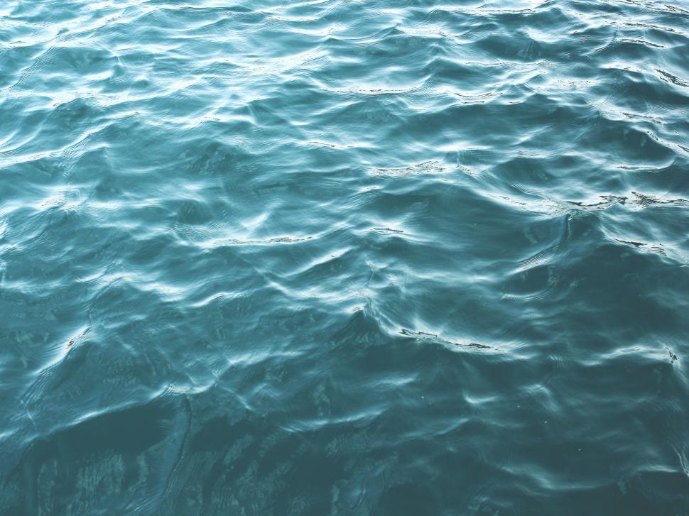 Free Image of A Large Body of Water With Waves 