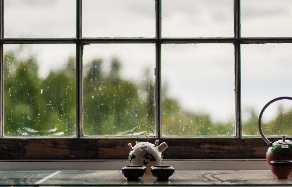 Free Image of Two Tea Kettles on Window Sill 