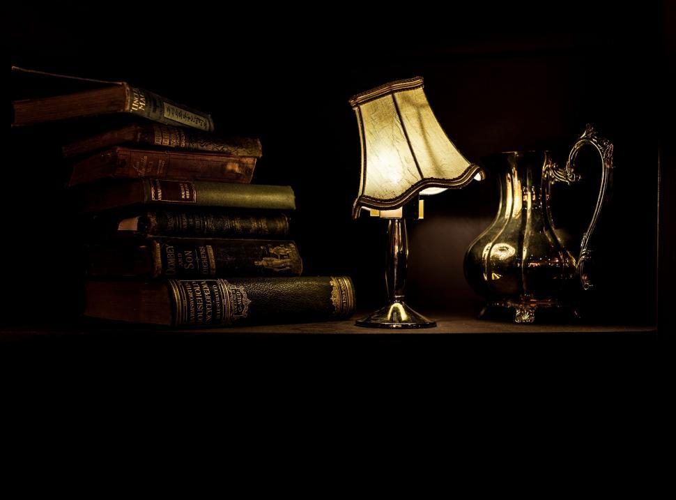 Free Image of Lamp and Books on Table 