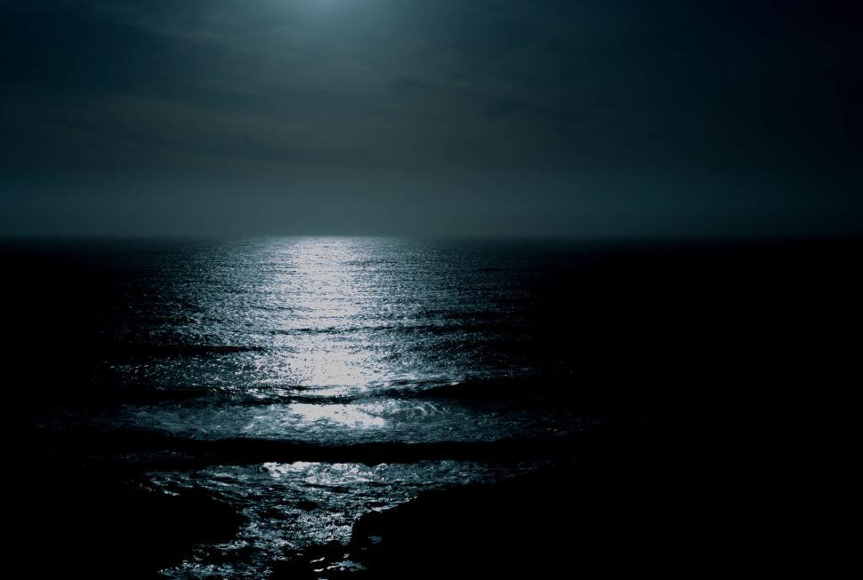 Free Image of Full Moon Shining Over the Ocean 