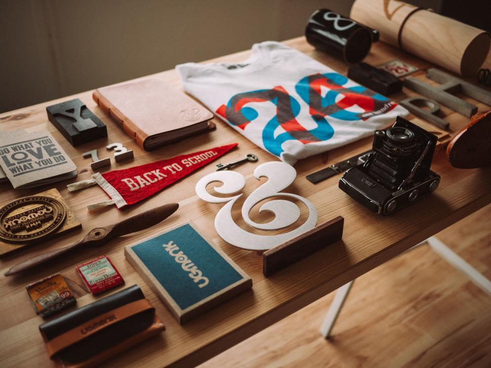 Free Image of Assorted Items on Wooden Table 