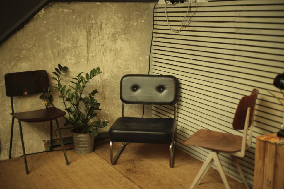 Free Image of Two Chairs Next to Each Other 
