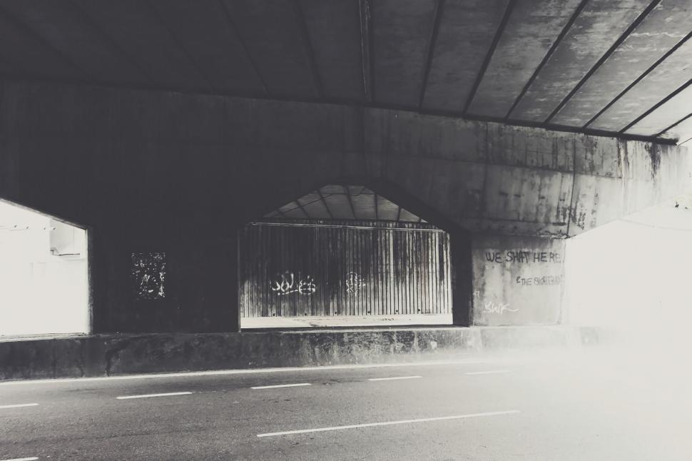 Free Image of Street Under a Bridge 