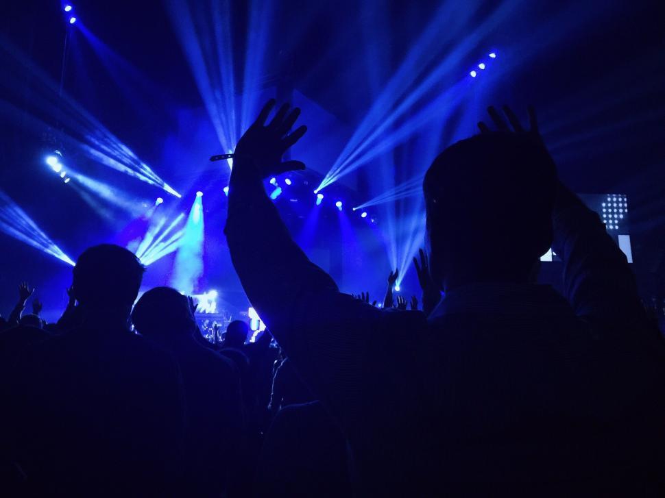 Free Image of Crowd of People at Concert With Hands in the Air 