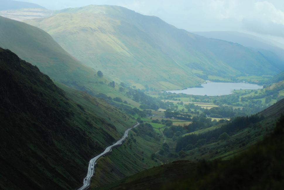 Free Image of A View of a Valley With a River Running Through It 