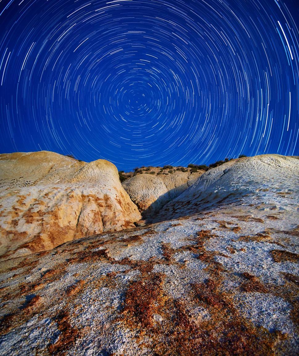 Free Image of Star Trail Over Rocks 