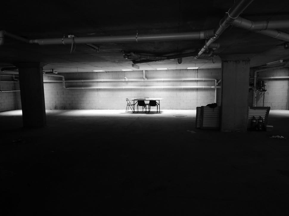 Free Image of A Bench in a Parking Garage 