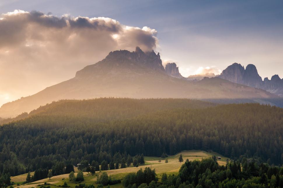 Free Image of Majestic Mountain Range With Clouds in the Sky 
