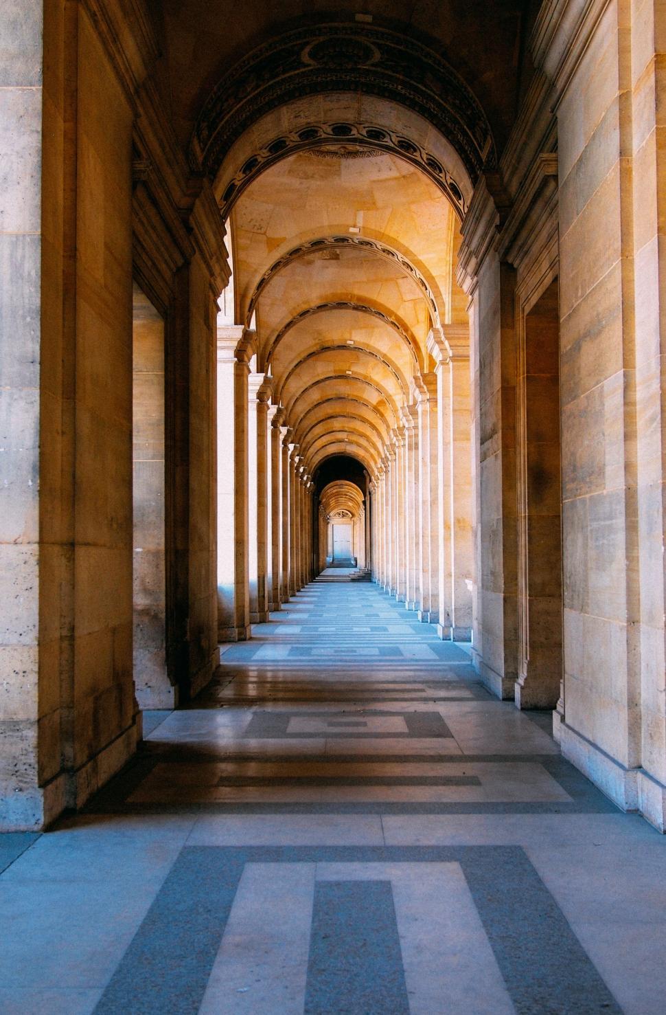 Free Image of Grand Hallway With Columns and Arches 