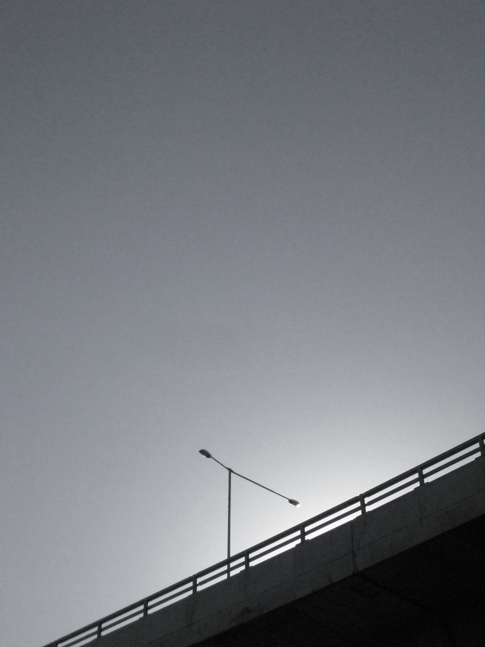 Free Image of Black and White Photo of a Street Light 
