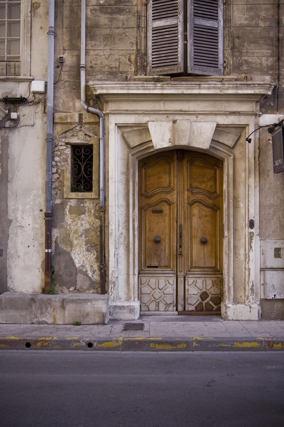 Free Image of Old Building With a Large Wooden Door 