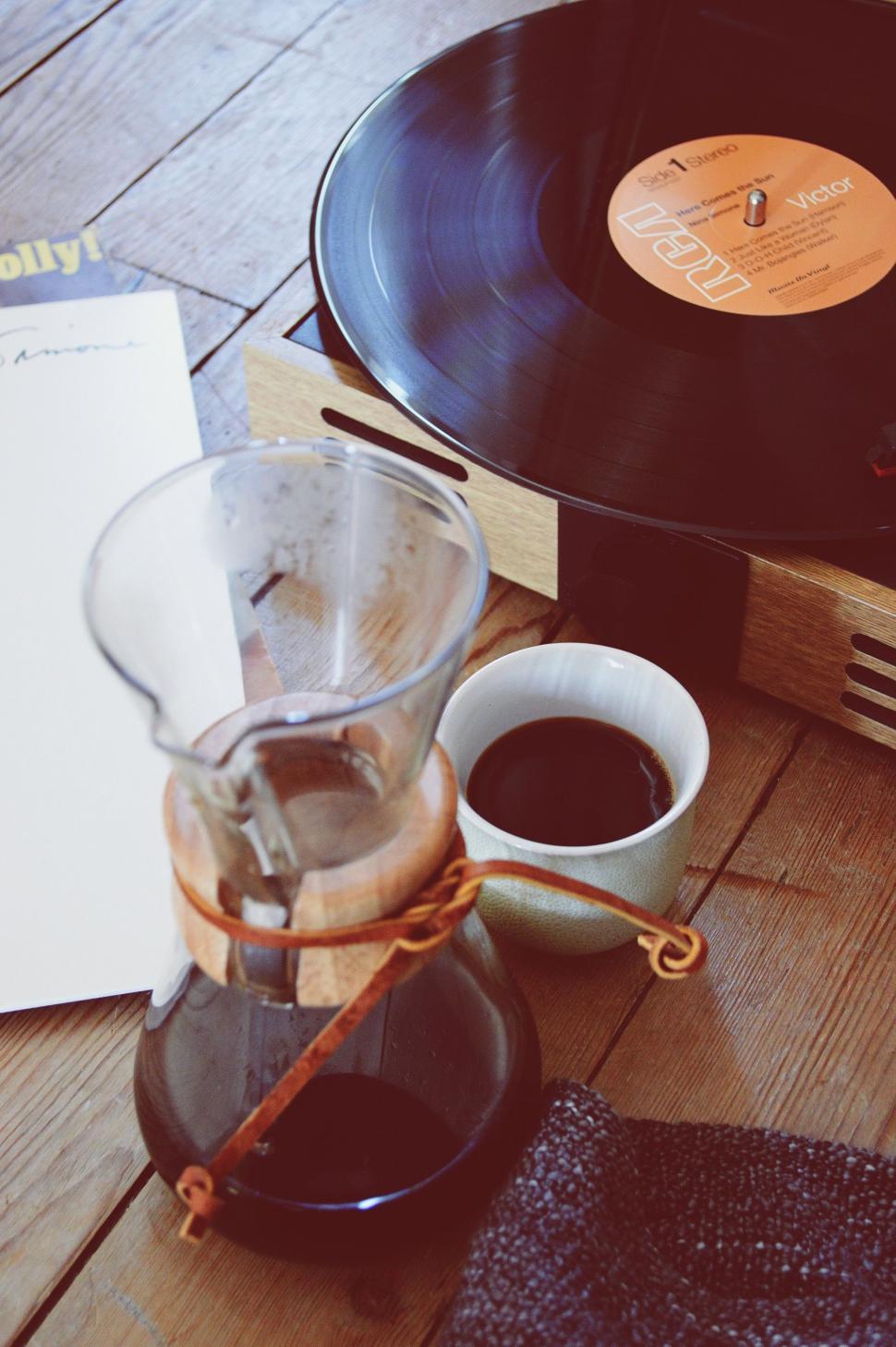 Free Image of Record Player and Cup of Coffee on Table 