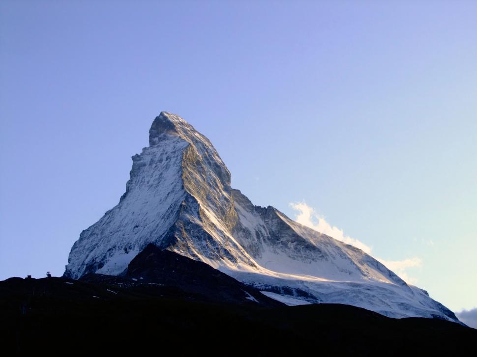 Free Image of Majestic Mountain Towering Against Sky 
