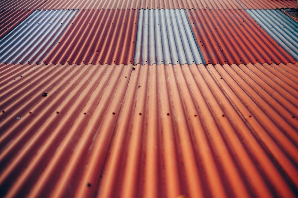 Free Image of Metal Roof With Blue and Red Stripes 