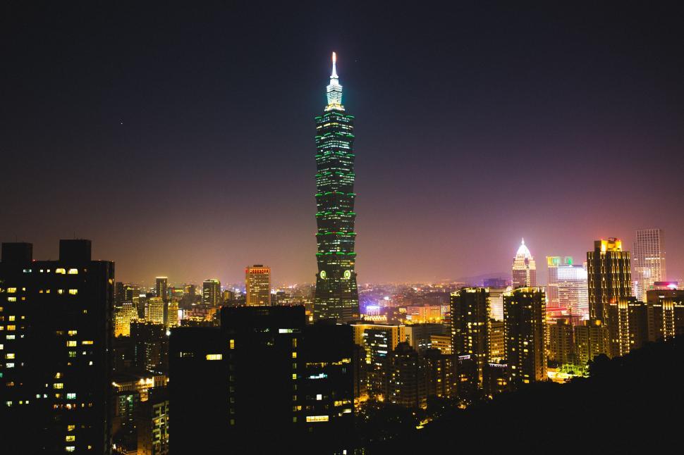 Free Image of Towering Tall Building Over City at Night 