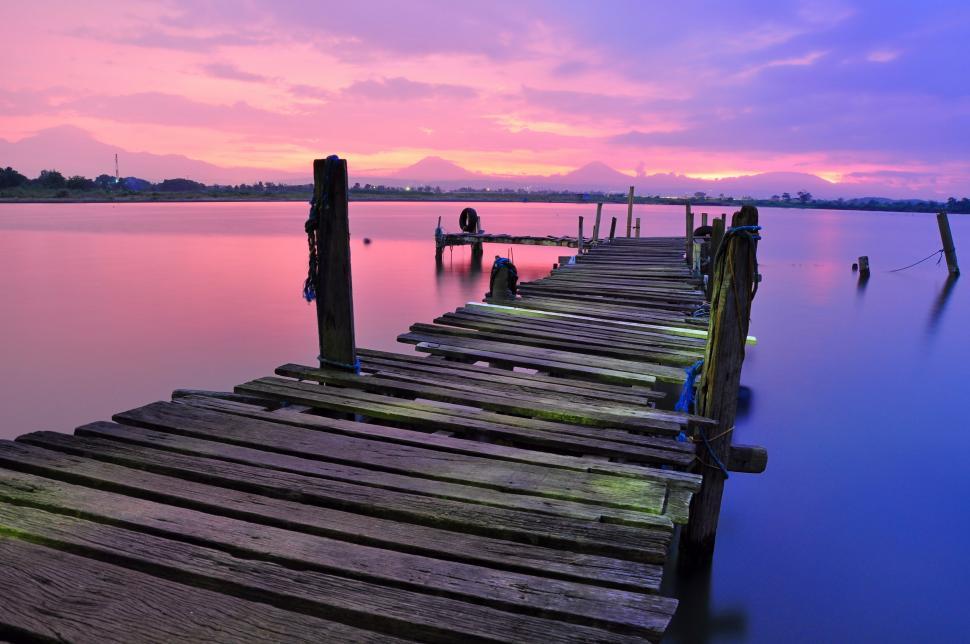 Free Image of Wooden Dock in Middle of Lake 
