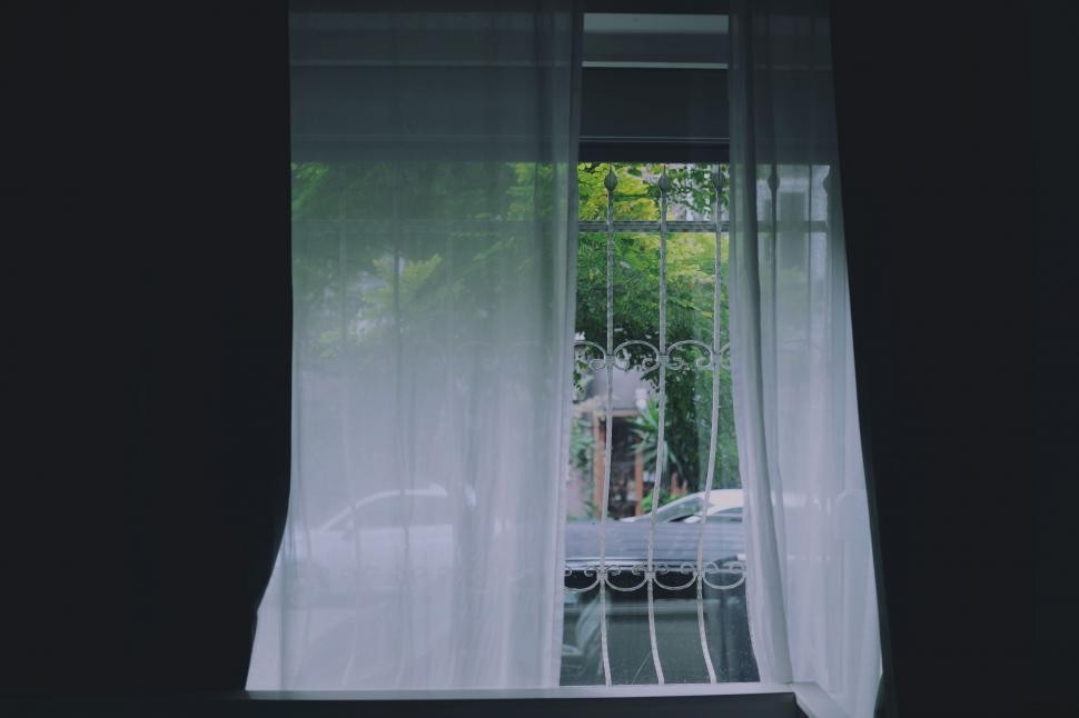 Free Image of White Curtain Window With White Car Background 