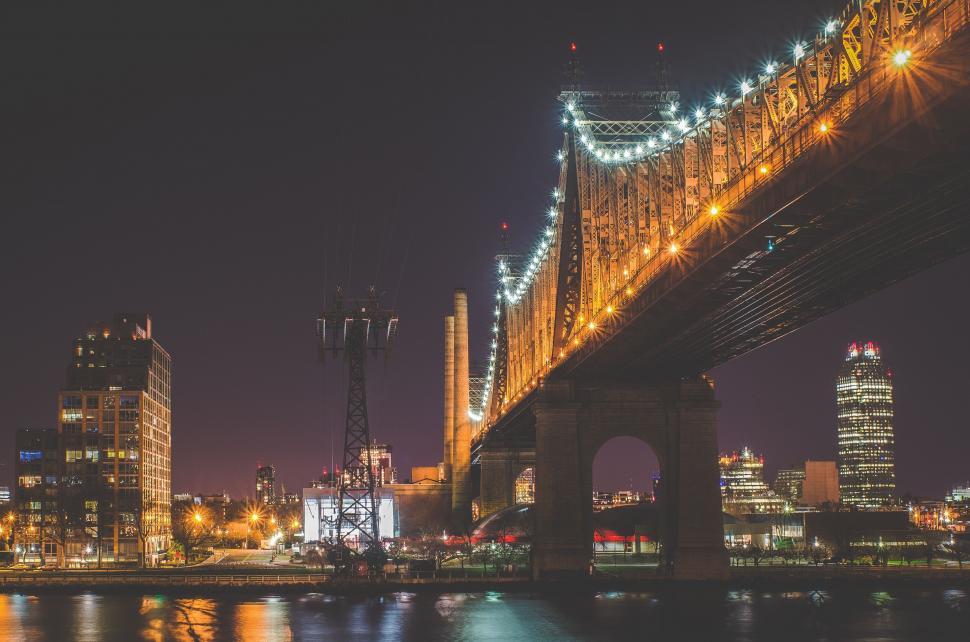 Free Image of Night View of a Bridge Over a River 